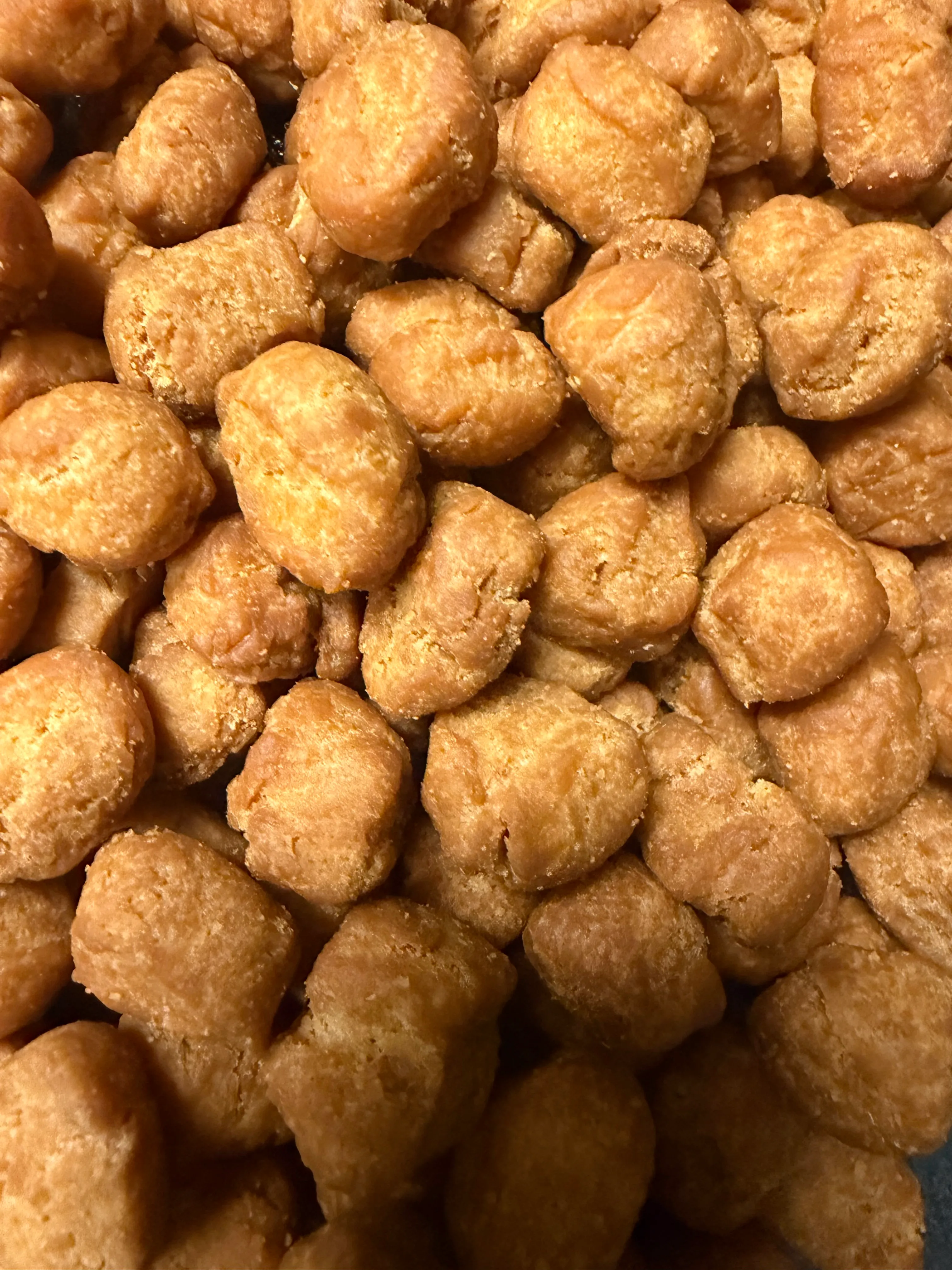 Close-up of golden ChinChin cookies showing their crunchy texture