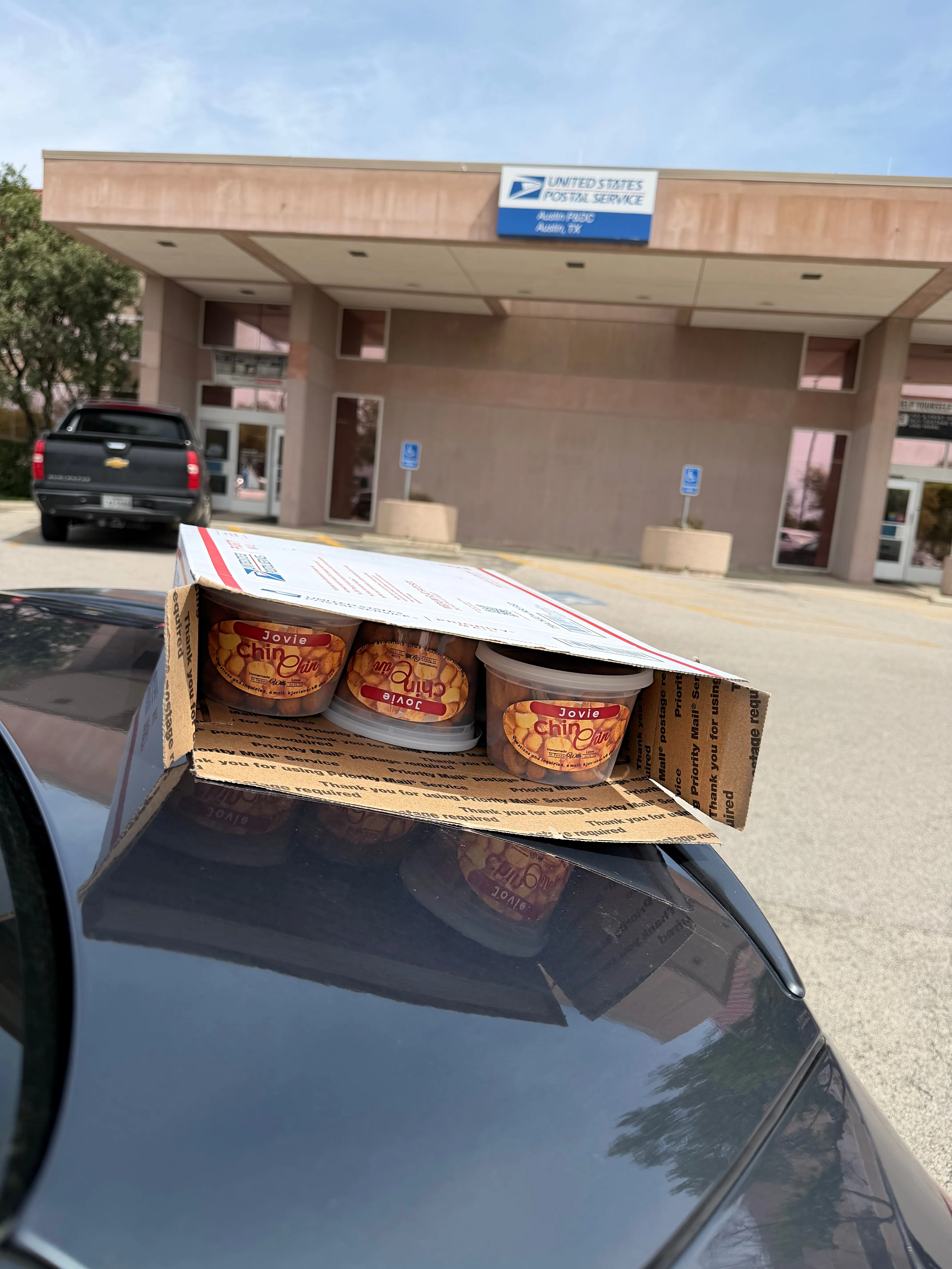 A box of Jovie ChinChin tubs ready to ship